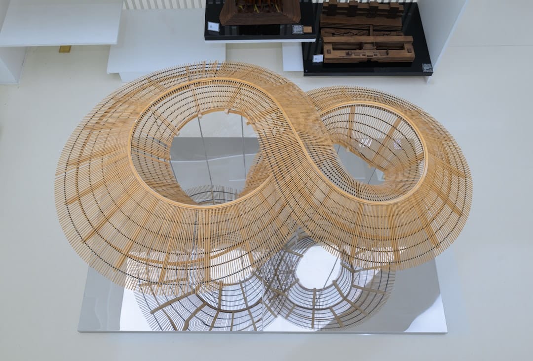A clean, modern desk with architectural blueprints spread out next to a laptop, symbolizing a strategic plan for local SEO.
