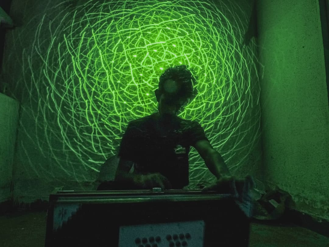 A professional in a modern setting interacting with a holographic interface displaying interconnected data points, representing the future of real estate technology.