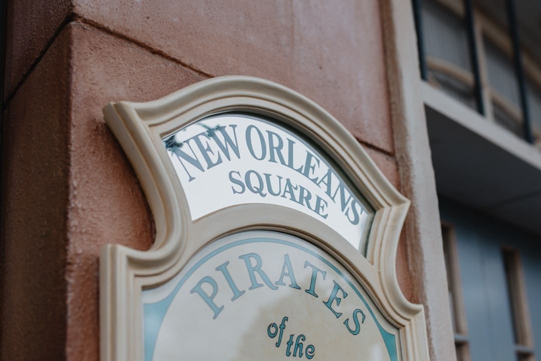 Bright, professional storefront of a successful local business on a sunny street in the New Orleans Garden District, repre...