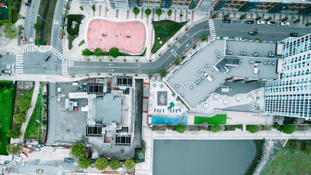 A bright, top-down aerial view of a dense city grid, illustrating the concept of comprehensive local market dominance and visibility.