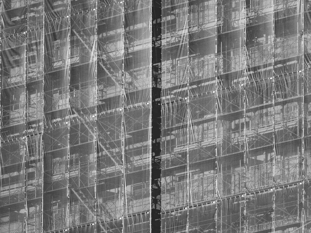 A close-up photograph of a detailed architectural blueprint, symbolizing a well-structured and replicable business framework.