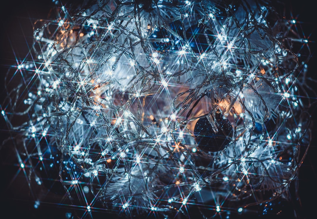 An abstract digital visualization of glowing nodes and interconnected lines on a dark background, representing a company's complex knowledge graph and data network.