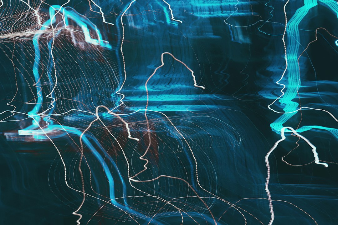 An abstract visualization of glowing blue nodes connected by lines on a dark background, illustrating the concept of a unified digital framework connecting disparate data points.