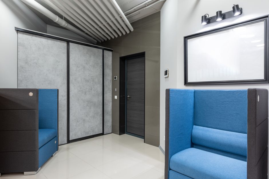 The clean, minimalist door of a modern bank vault, symbolizing a defensible, secure, and valuable brand asset created through Entity SEO.