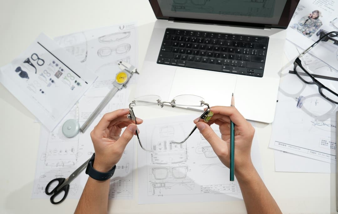 Medical stethoscope rests on a detailed architectural blueprint, symbolizing the application of structured data standards ...